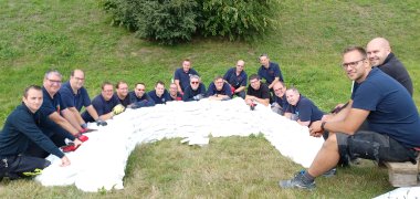 Feuerwehrleute beim Seminar Hochwasserschutz