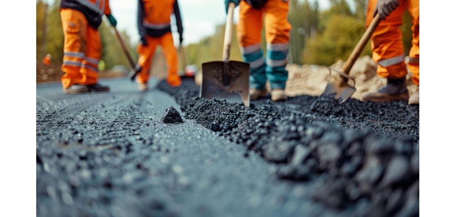 Asphalt und Bauarbeiter